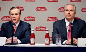 H.J. Heinz Co. CEO William Johnson (l) and 3G Capital Managing Partner, Alex Behring, speak at a news conference. [AP]
