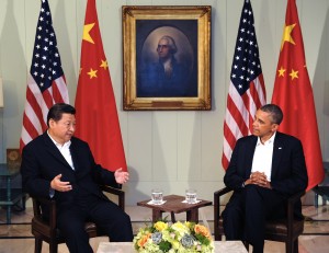Xi, left, says he had candid talks with Obama [Xinhua]