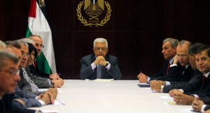 Abbas (center) chairs a session of the Palestinian Cabinet in the West Bank city of Ramallah [AP]