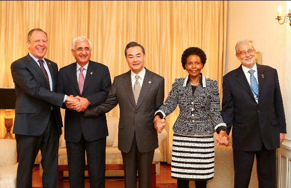 (L to R) Russian Foreign Minister Sergei Lavrov, Indian External Affairs Minister Shri Salman Khurshid, Chinese Foreign Minister Wang Yi, South African Minister of International Relations and Cooperation Maite Nkoana-Mashabane and Undersecretary-General for Political Affairs, Ambassador Carlos Antonio Paranhos of Brazil, at a BRICS meeting of foreign ministers during the 2014 Nuclear Security Summit in The Hague, the Netherlands, March 24, 2014 [Xinhua]