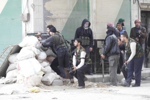 Father Frans said that the rebels (seen here in the city of Idlib) were better equipped and organized by March 2012 [Xinhua]