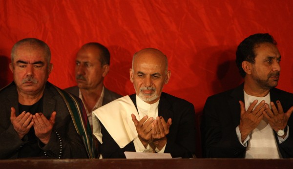 A preliminary tally from the independent electoral commission revealed that Ghani, center, was leading Abdullah by one million votes. Abdullah has alleged electoral fraud [Xinhua]