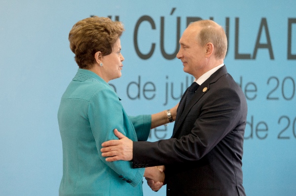  Russian President Vladimir Putin (R) is welcomed by Brazilian President Dilma Rousseff prior to the 6th BRICS Summit in Fortaleza, Brazil, July 15, 2014 [Xinhua]