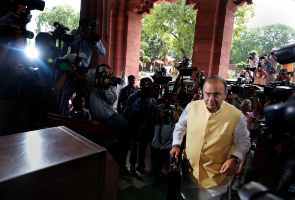 Indian Finance Minister Arun Jaitley arrives to present the 2014-15 union budget at the Indian parliament in New Delhi, Thursday, July 10, 2014 [AP]