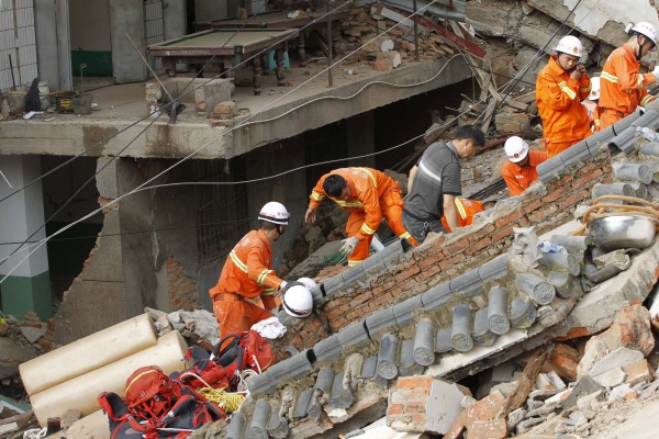 Rescue workers have been in a race against time to save people who may yet be under the rubble of buildings destroyed during Sunday's earthquake [Xinhua]