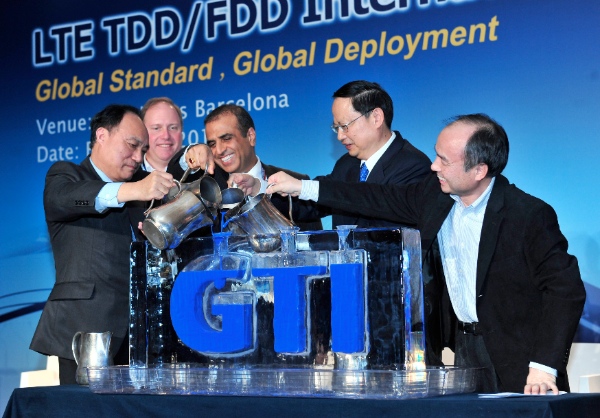 File photo of Zhao Houlin (extreme left) with Bharti Mittal (third from left), chairman of Bharti Airtel from India at the 2011 Mobile World Congress in Barcelona, Spain [Xinhua] 