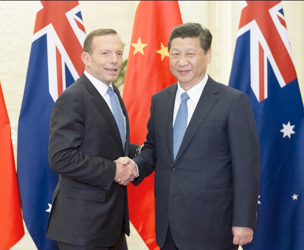  Chinese President Xi Jinping (R) meets with visiting Australian Prime Minister Tony Abbott at the Great Hall of the People in Beijing, capital of China, April 11, 2014 [Xinhua]