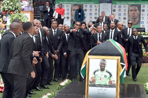 Team members of Orlando Pirates pay thier last respect to Senzo Meyiwa during the funeral of Senzo Meyiwa at Moses Mabhida Stadium in Durban, South Africa, on Nov. 1, 2014 [Xinhua]