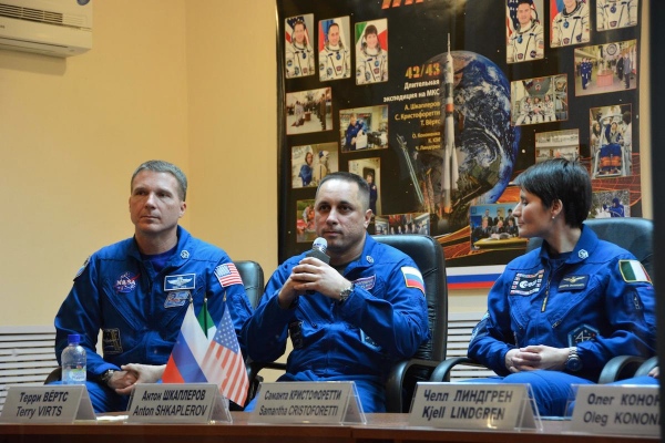 From left to right: Terry Virts from the US space agency NASA, Russian cosmonaut Anton Shkaplerov, and European Space Agency ( ESA) astronaut Samantha Cristoforetti at a press conference at Baikonur station on 23rd November 2014 [Image: Roscosmos]