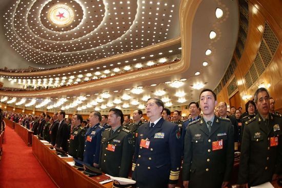 Deputies sing the national anthem during the opening meeting of the first session of the 12th National People's Congress (NPC) at the Great Hall of the People in Beijing, capital of China, March 5, 2013 [Xinhua]