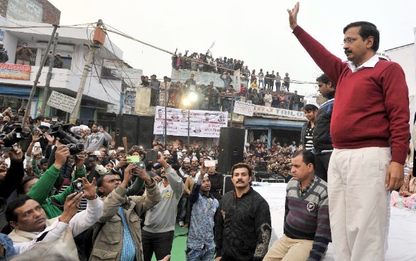 Aam Aadmi Party (AAP) supremo and Delhi Chief Minister candidate Arvind Kejriwal (1st R) attends an election campaign in East Delhi, India, Feb. 3, 2015 [Xinhua]