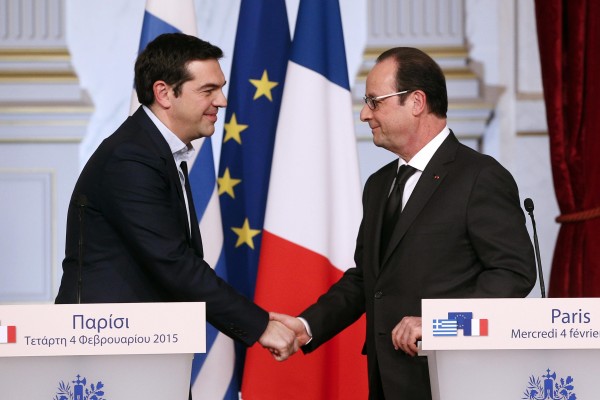 Greece's Tsipras, left, hopes Hollande can offset German apprehension regarding a re-positioning of Greek debt repayments [Xinhua]