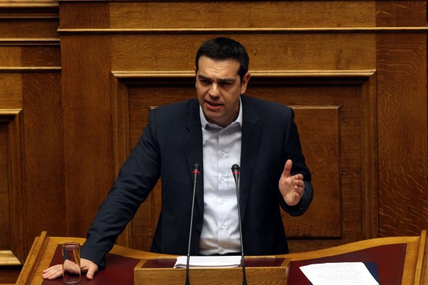Greek Prime Minister Alexis Tsipras told parliament that he will cut taxes and raise minimum wage as he tries to restructure debt payments to the EU [Xinhua]