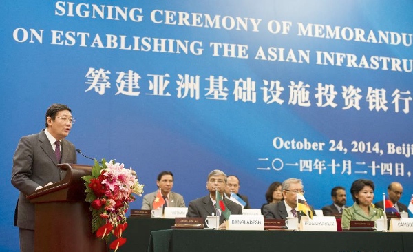 Chinese Finance Minister Lou Jiwei speaks at the signing ceremony of the Memorandum of Understanding on Establishing Asian Infrastructure Investment Bank (AIIB) in Beijing, capital of China, Oct. 24, 2014 [Xinhua]