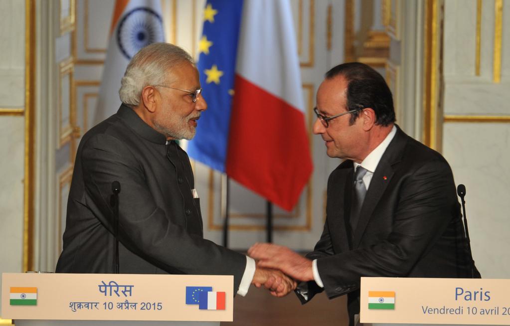 Indian Prime Minister Modi with French President Francois Hollande in Paris on 10 April 2015. India seems to have relented on the clause of "Make in India" for the Rafale deal [Xinhua] 