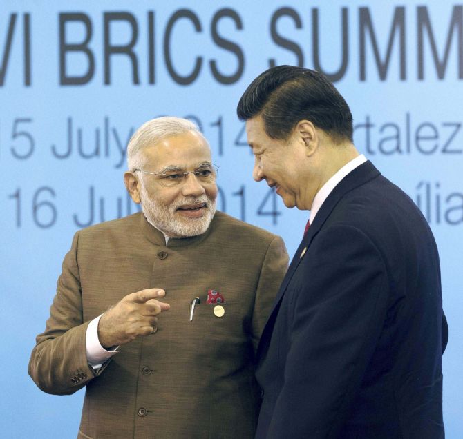 Indian Prime Minister Narendra Modi with Chinese President, Xi Jinping at the 6th BRICS Summit in July 2014 in Brazil [Xinhua]