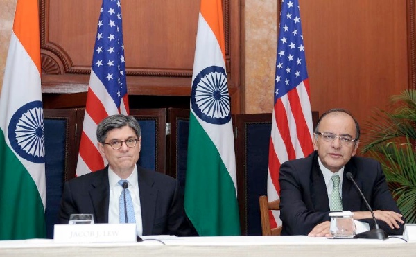 File photo of Indian Finance Minister Arun Jaitley (R) with US Treasury Secretary Jacob Lew . India forecast its growth will accelerate this fiscal year under a revised method for calculating gross domestic product that has confused economists since it was unveiled in early 2015 [Xinhua]