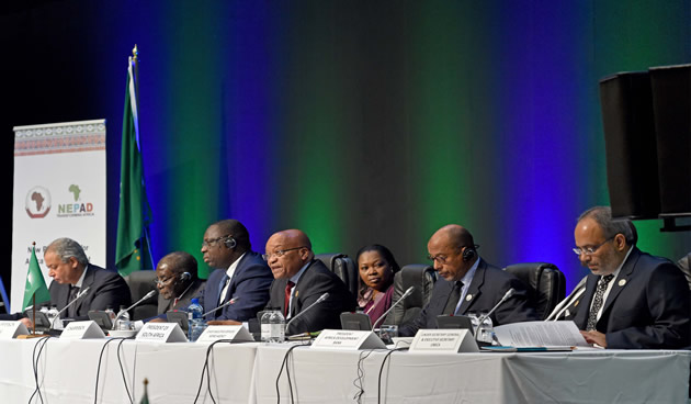 President Jacob Zuma, AU Chairperson President Robert Mugabe, Senegal President Macky Sall, among others at the 33rd Session of the NEPAD Heads of State and Government Orientation Committee (HSGOC) held on the margins of the African Union's 25th Summit at Sandton Convention Centre, Johannesburg on 13 June 2015 [GCIS]