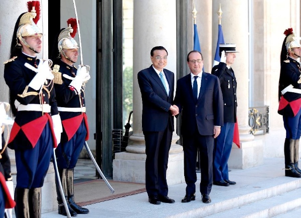 French President Francoise Hollande with Chinese Premier Li Keqiang in Paris, France on 30 June 2015 [Xinhua]