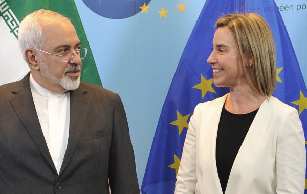 Zarif, left, and Mogherini announced the agreement in Vienna on Tuesday. They have been meeting for much of the past year [Xinhua Archive]
