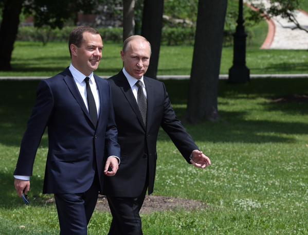 File Photo: Russian Premier Dmitry Medvedev (left) with Russian President Vladimir Putin [Image: Xinhua]