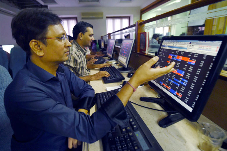 File photo of stock brokers at the Bombay Stock Exchange [Xinhua]
