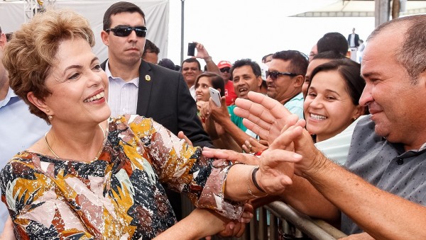 President Dilma Rousseff's popularity helped her get reelected in 2014 but can the worst economic crisis in Brazil's history be her undoing? [Xinhua]
