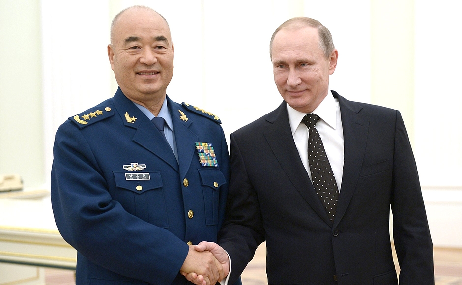 Putin with Vice Chairman of China’s Central Military Commission Xu Qiliang at the Kremlin on 17 November 2015 [Xinhua]