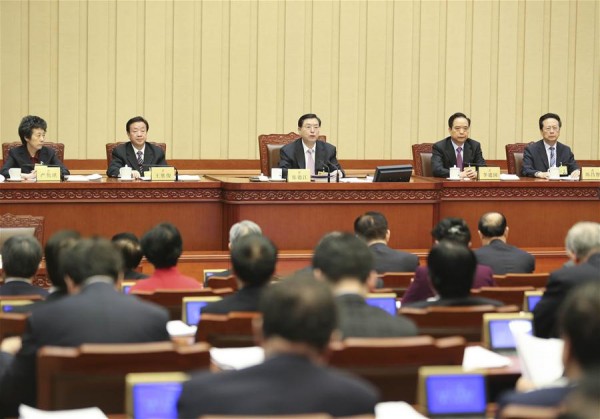Zhang Dejiang (C), chairman of the Standing Committee of China's National People's Congress (NPC), presides over the closing meeting of the 18th bimonthly meeting of the National People's Congress (NPC) Standing Committee, in Beijing, capital of China, on Dec. 27, 2015 [Xinhua]