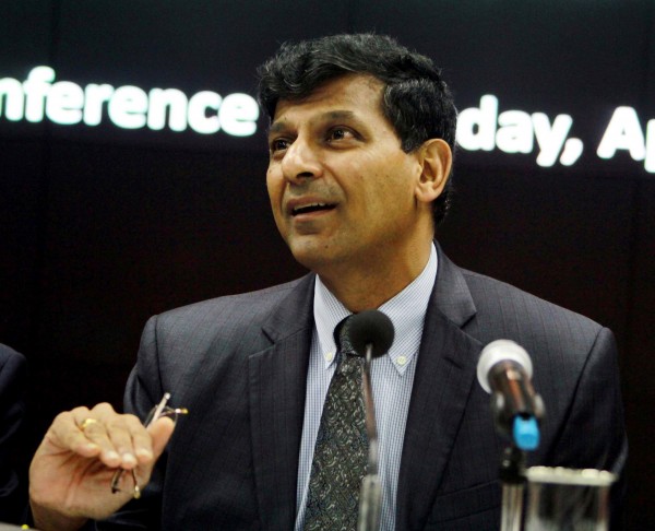 Rajan is encouraged by GDP growth but opted not to cut repo rates as inflation rises and the world awaits a US Fed decision on its interest rates [Xinhua]
