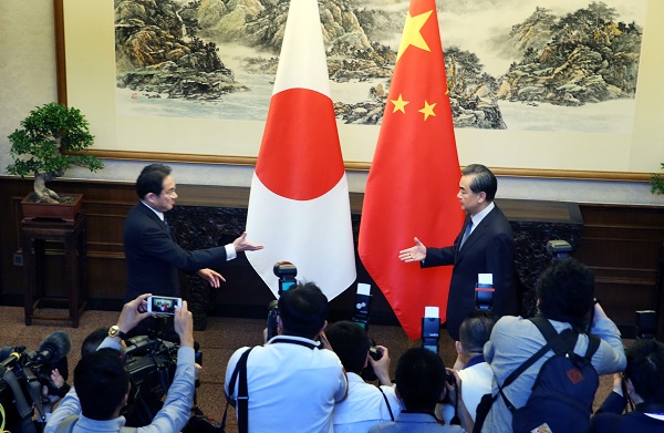 Chinese Foreign Minister Wang Yi (R) at a press interaction with Japanese Foreign Minister Fumio Kishida in Beijing, capital of China, April 30, 2016 [Xinhua]