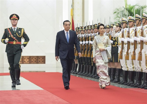Chinese Premier Li Keqiang (2nd L) holds a welcoming ceremony for Myanmar's State Counsellor Aung San Suu Kyi at the Great Hall of the People in Beijing, capital of China, Aug. 18, 2016 [Xinhua]