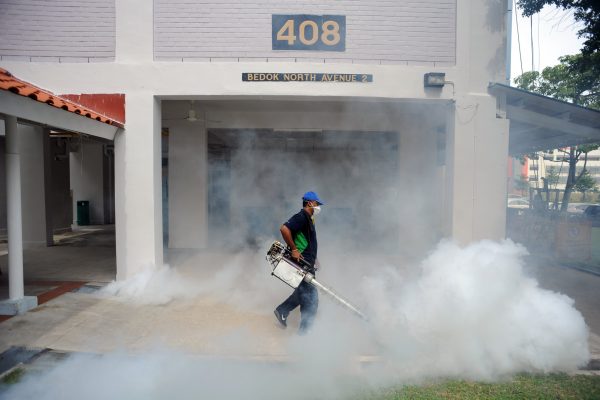 As Zika cases spike in Singapore, the government has been spraying insecticide in and around residential districts [Xinhua] 