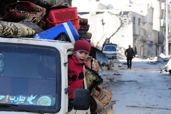 Tens of thousands of civilians have streamed out of former battle zones in search of safety and security in Aleppo [Xinhua]