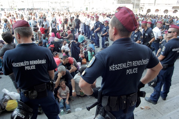 Refugees are prevented by police from entering the Keleti railway station in Budapest, Hungary on September 1, 2015 [Xinhua]